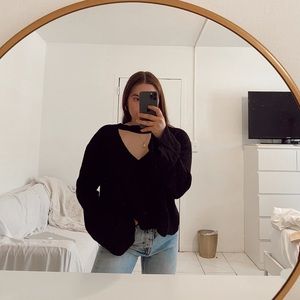 Black sweater with cutout and bell sleeves